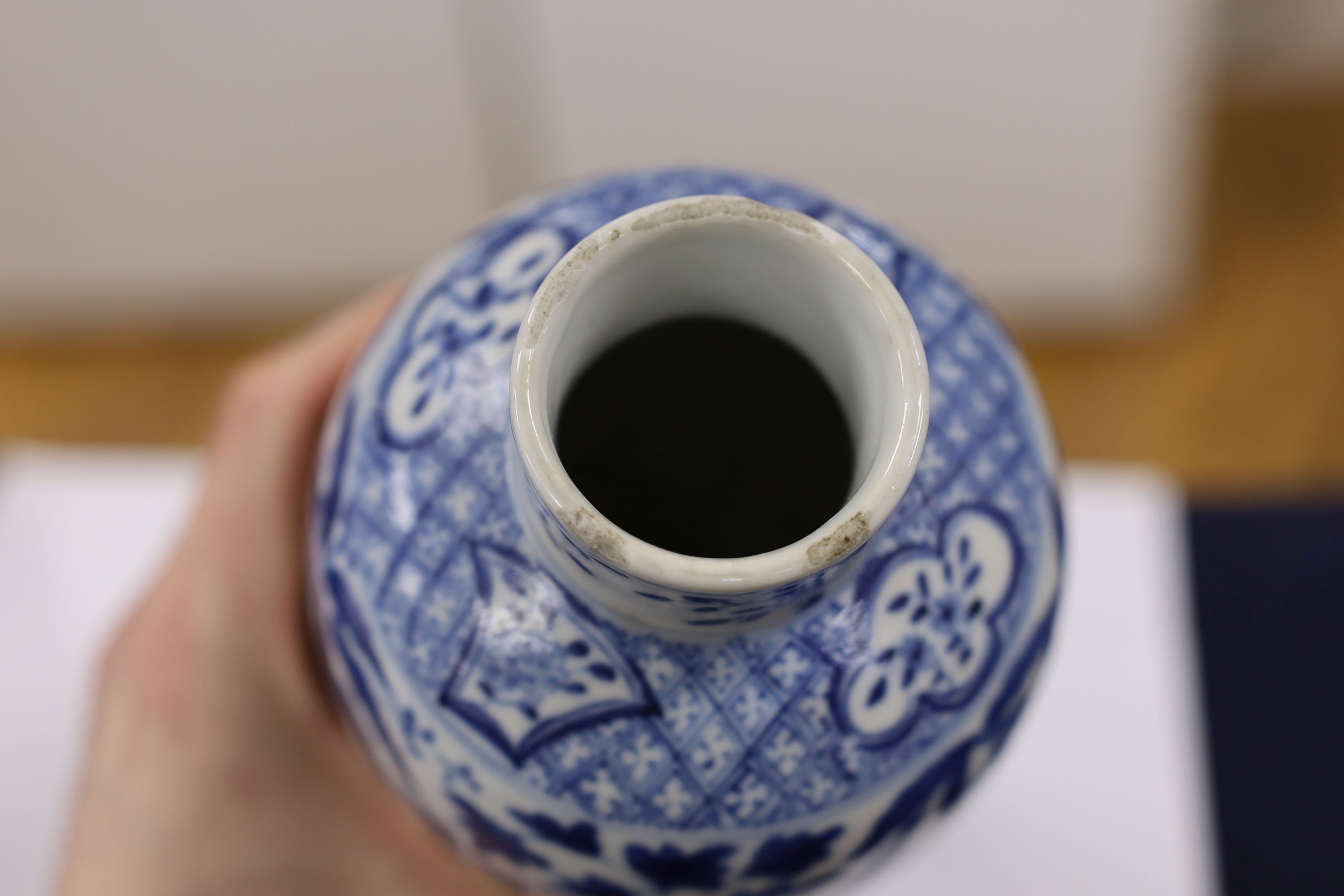 A pair of Chinese blue and white dragon vases and covers, circa 1900. 28cm